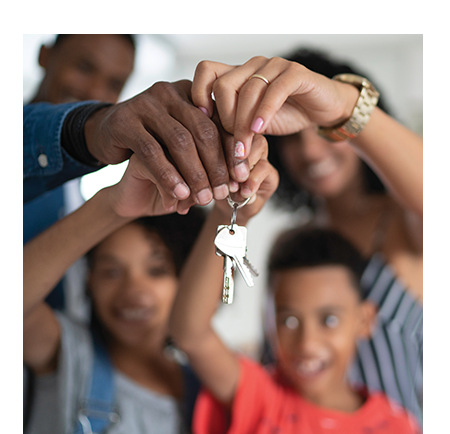 Family holiding house keys