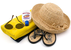 Straw hat, sunscreen and sunglasses