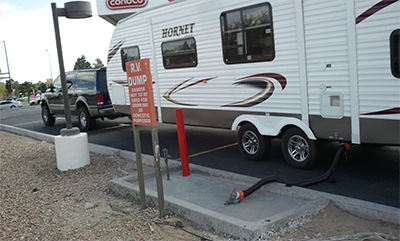 RV pulled up to a dump station