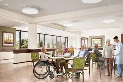 A rendering of a large bright dining room where multiple senior citizens are seated, some in wheelchairs