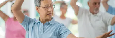 Group of people practising Tai Chi