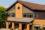 Exterior view of Woodlands of Sunset long-term care home