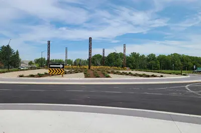 The roundabout roads are fully paved and signage is in place