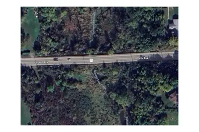 A satellite view of Fourth Avenue surrounded by trees