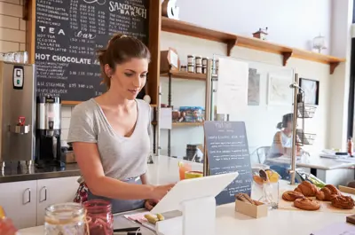 Woman working in a coffee shop