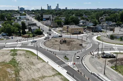 Victoria Avenue and Bridge Street intersection in Niagara Falls during construction in July 2022 with the road operational. Cars are seen driving on it.