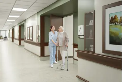 A rendering of a female employee walking an elderly woman through a facility hallway