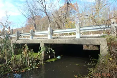 Four Mile Pond Culvert. A bridge over water